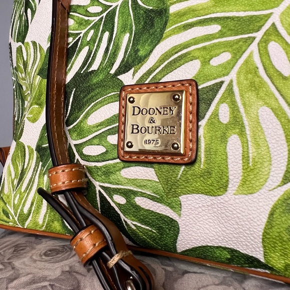 Dooney and Burke purse, palm leaves in good condition. Lightly used. - Picture 2 of 4